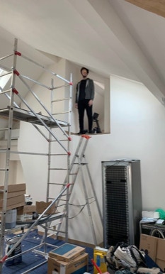 Escalier de bistrot courbe puis droit avec sortie latérale sur palier